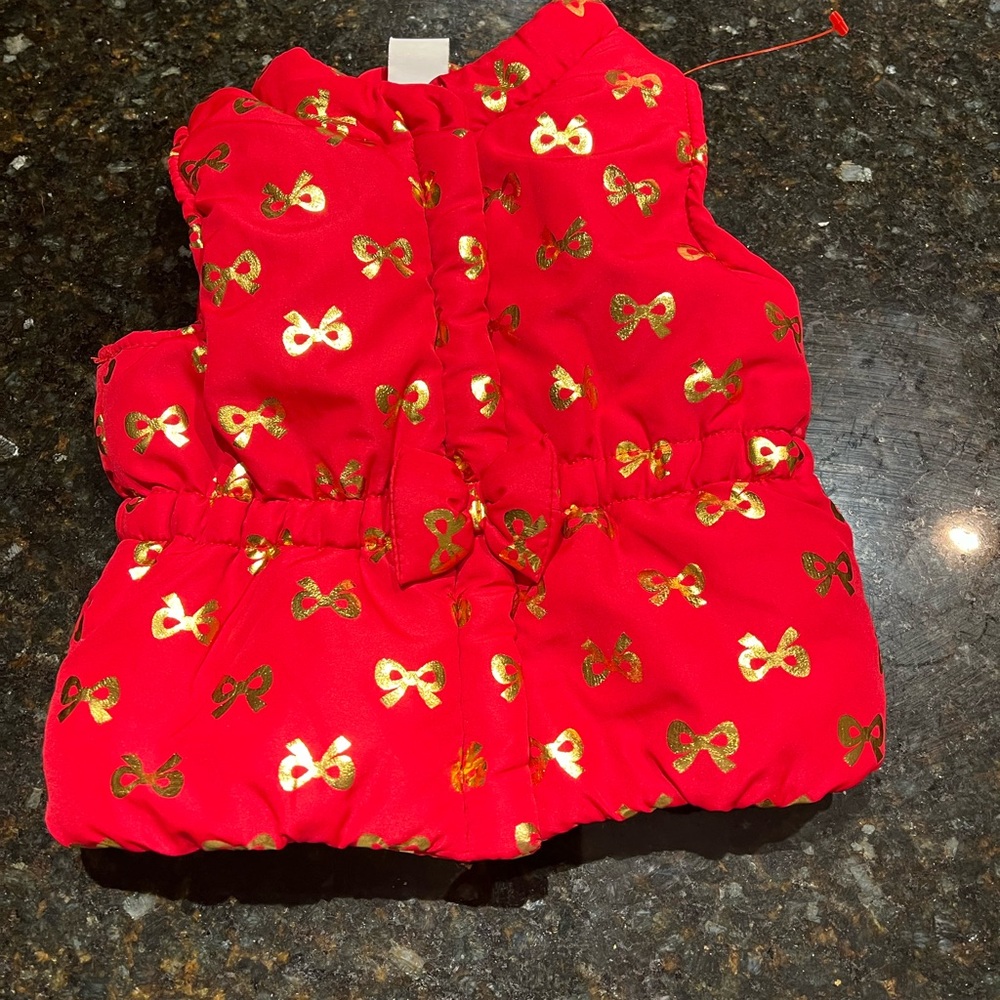 New red holiday puffer vest. 6-9 month